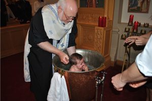 Little Boy During Baptismal Service